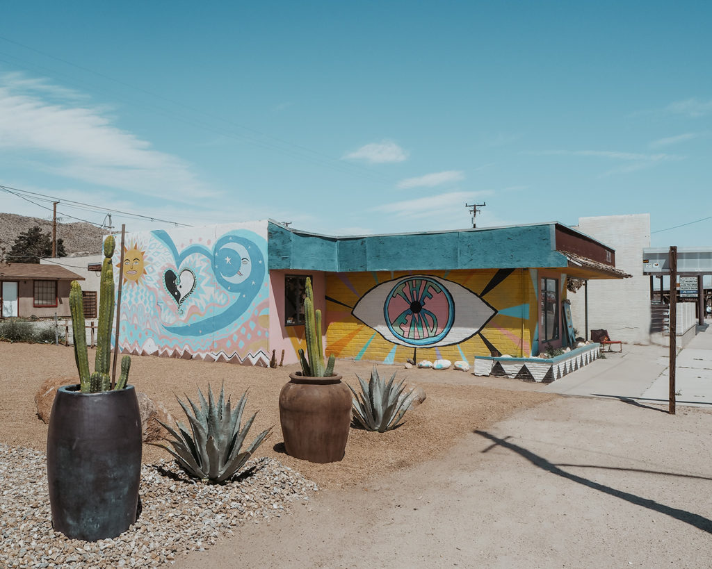 Vintage Shop in Yucca Valley with bright colorful paintings on the walls